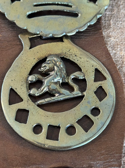 Set of Four Vintage Horse Brasses Mounted on Leather Strap - Veranda Cafe & Mercantile