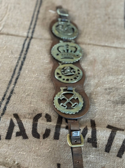 Set of Four Vintage Horse Brasses Mounted on Leather Strap - Veranda Cafe & Mercantile