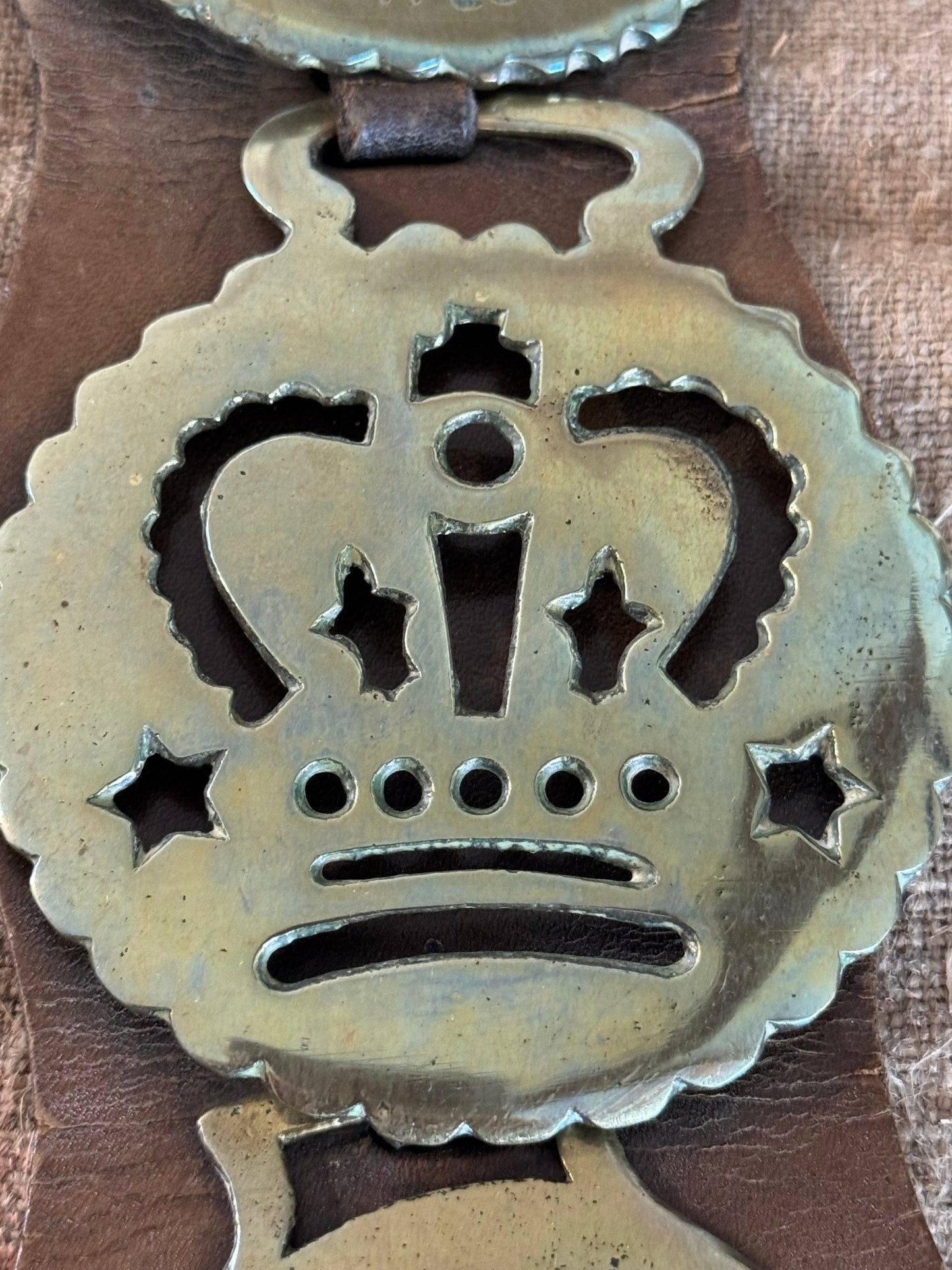 Set of Four Vintage Horse Brasses Mounted on Leather Strap - Veranda Cafe & Mercantile
