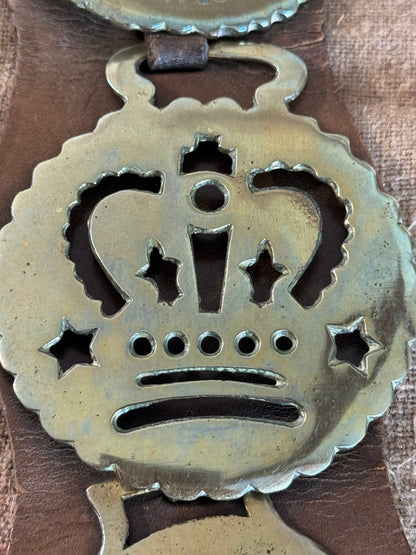 Set of Four Vintage Horse Brasses Mounted on Leather Strap - Veranda Cafe & Mercantile
