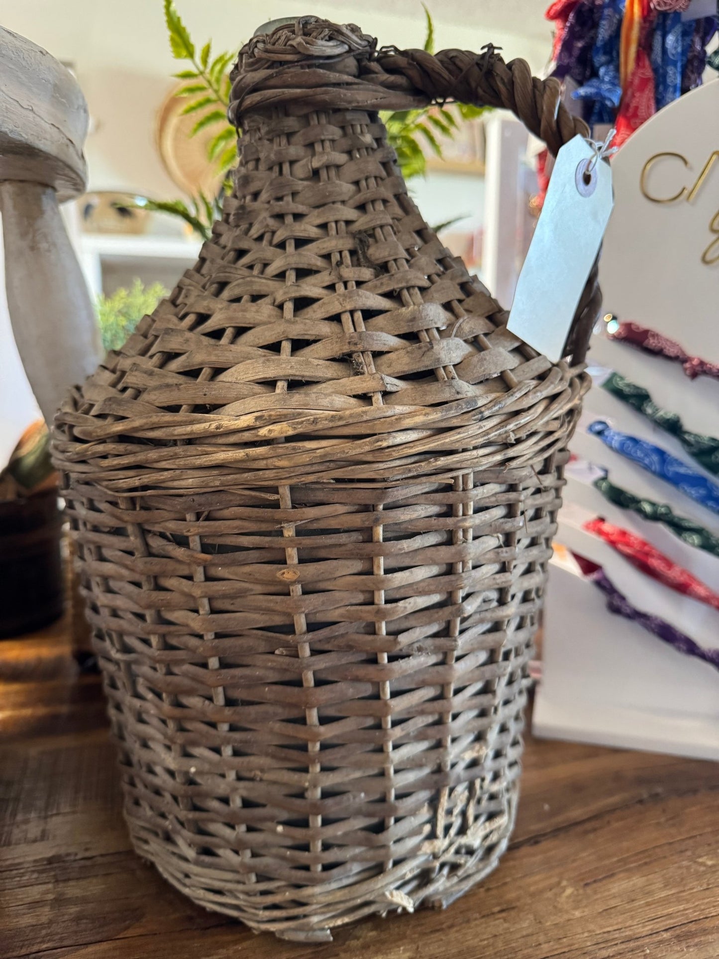 Wicker Covered Wine Bottle - Veranda Cafe & Mercantile