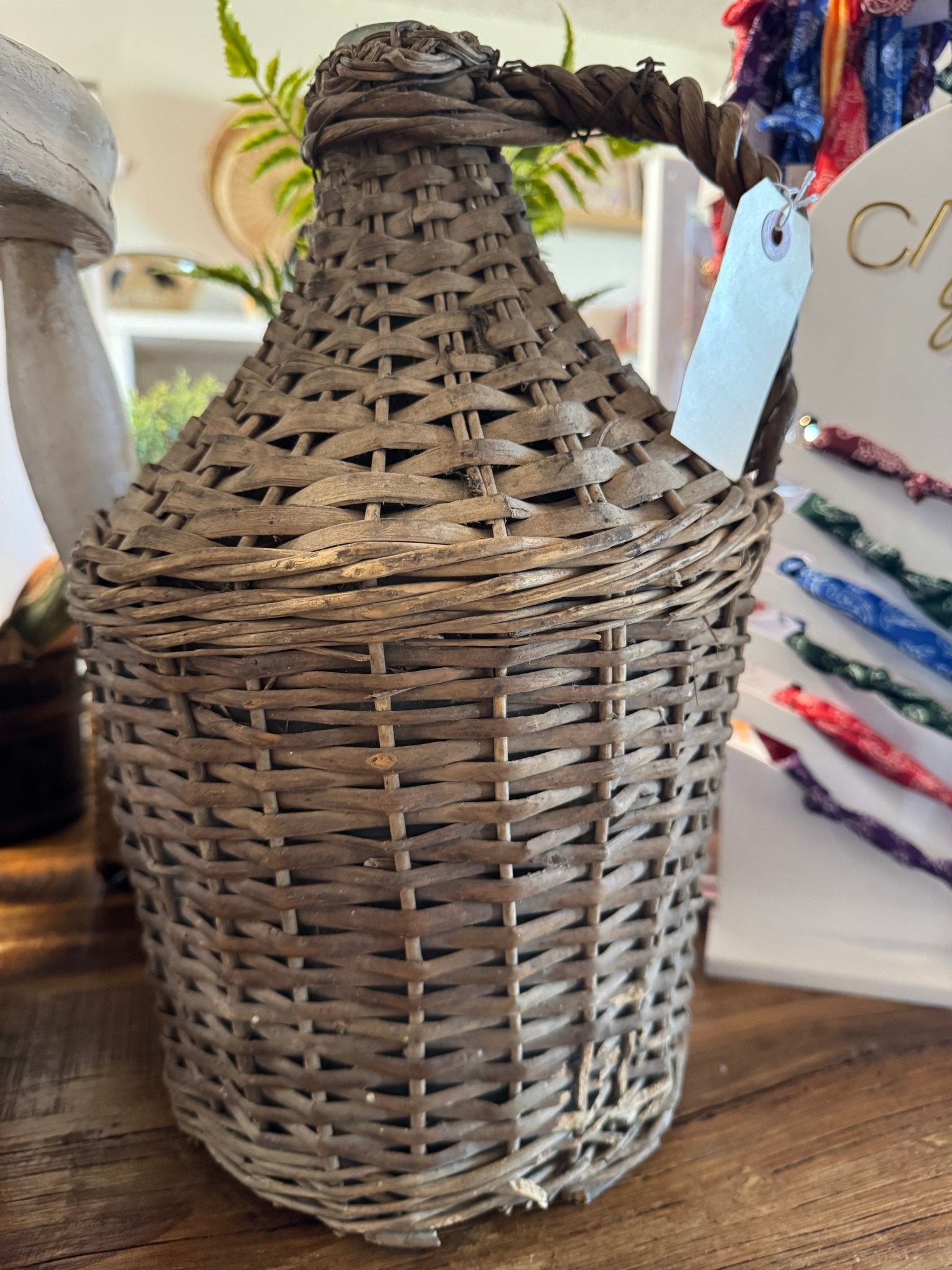Wicker Covered Wine Bottle - Veranda Cafe & Mercantile