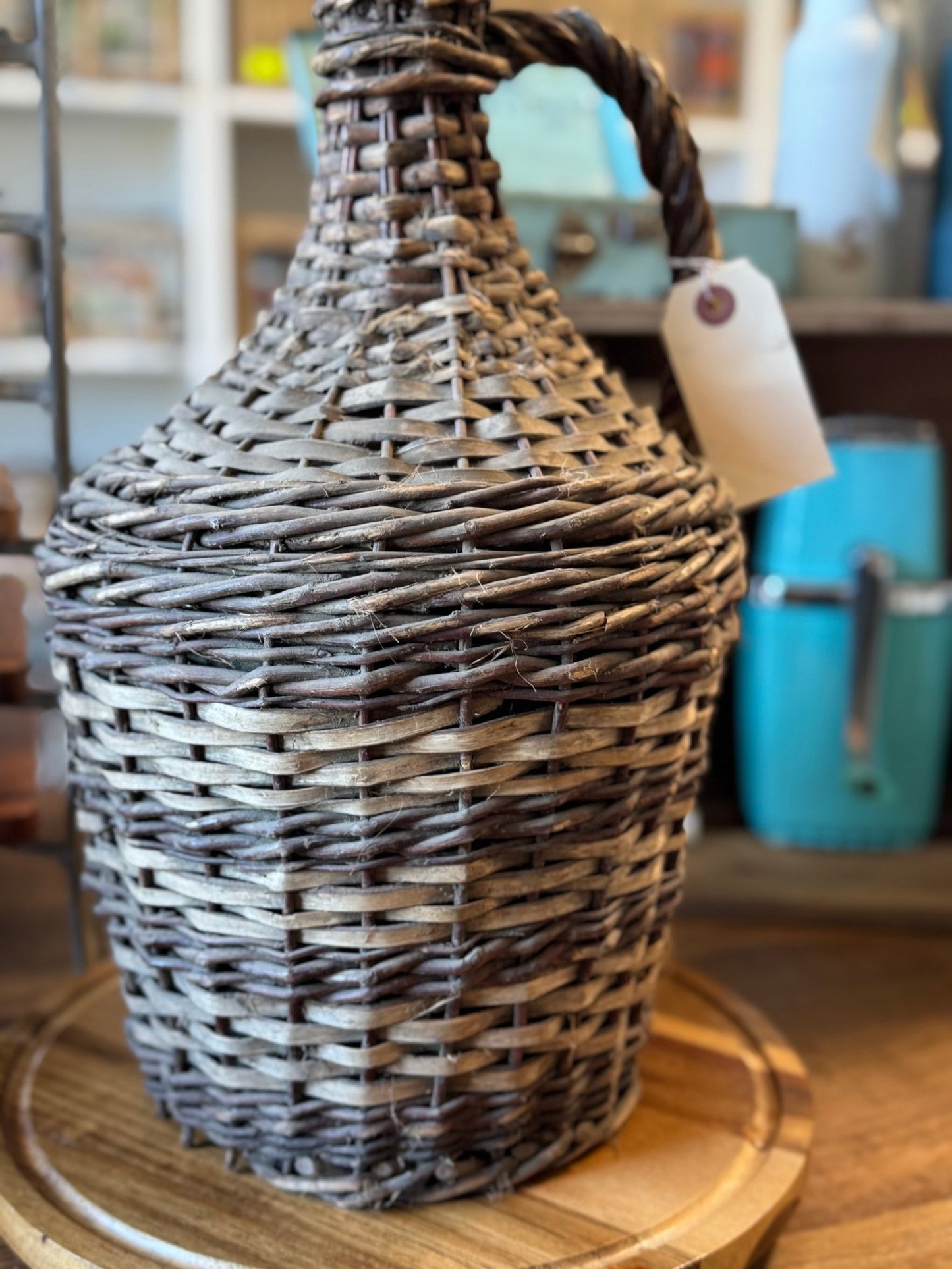 Wicker Covered Wine Bottle - Veranda Cafe & Mercantile