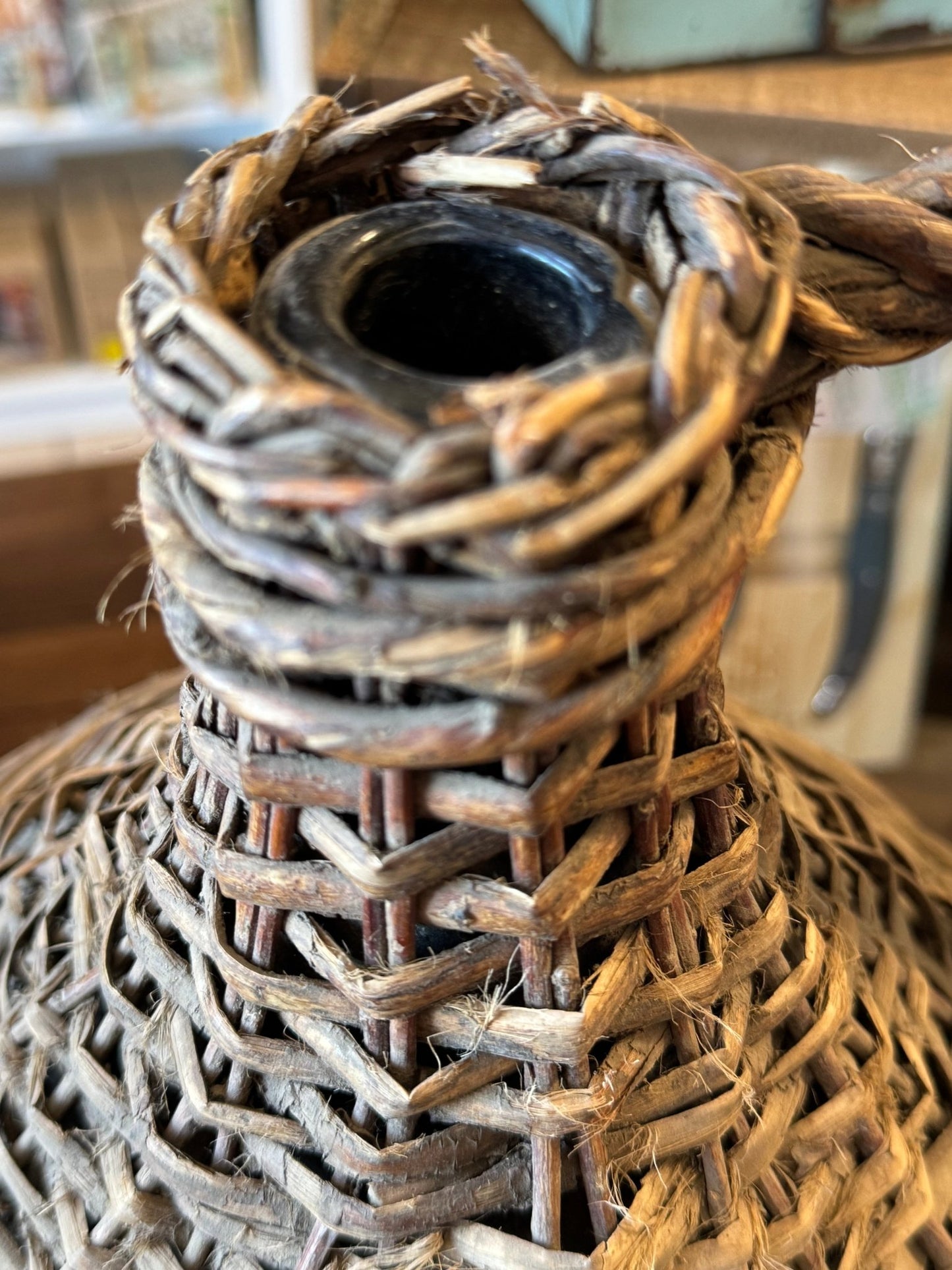 Wicker Covered Wine Bottle - Veranda Cafe & Mercantile